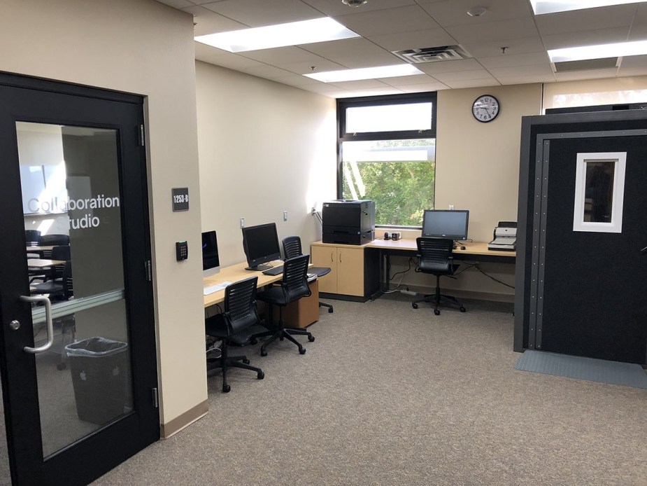 Technology Application & Discovery Lab features workstations, scanners, printer, and a soundbooth for high-quality media production.